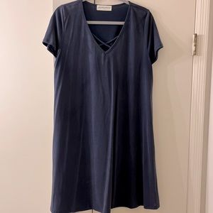 Pants Store. Navy shift dress with crossing detail around neck.